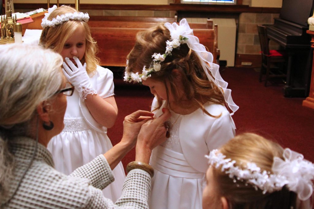 Mrs Haynes helps the girls get ready