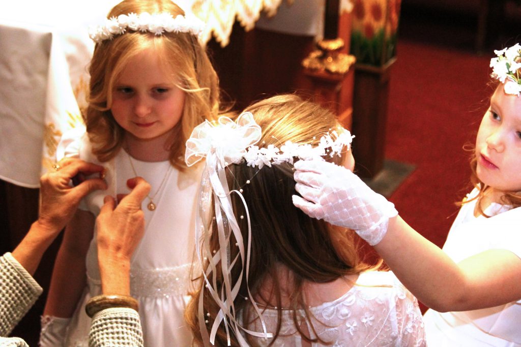 Prepping the girls in the sacristy