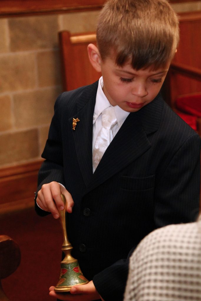 Waiting for Mass with a bell 