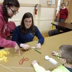 Lexi and Amanda help at Advent Night